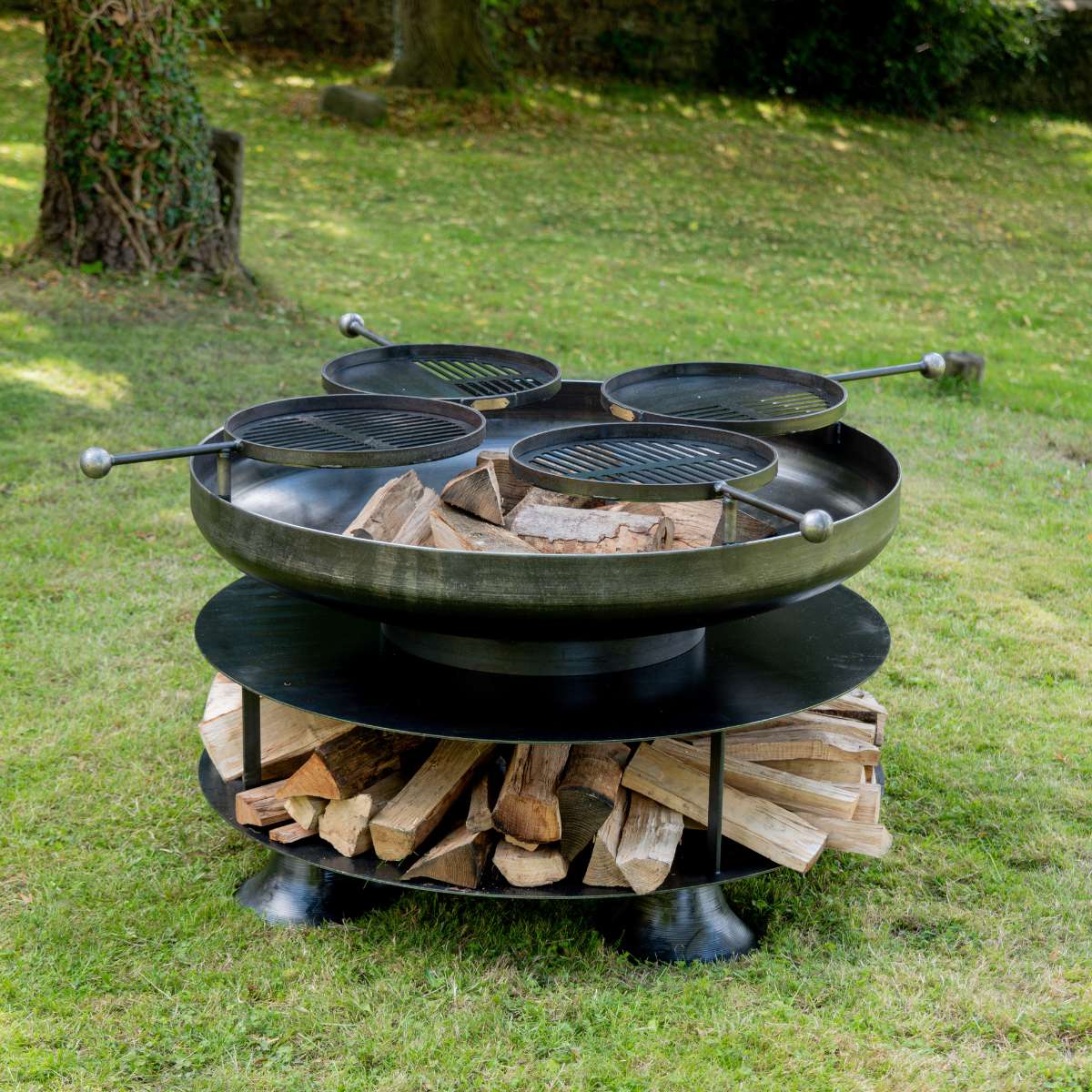 Firepits UK Ring of Logs with Four Swing Arm BBQ Racks 120cm ROL120SWA/4