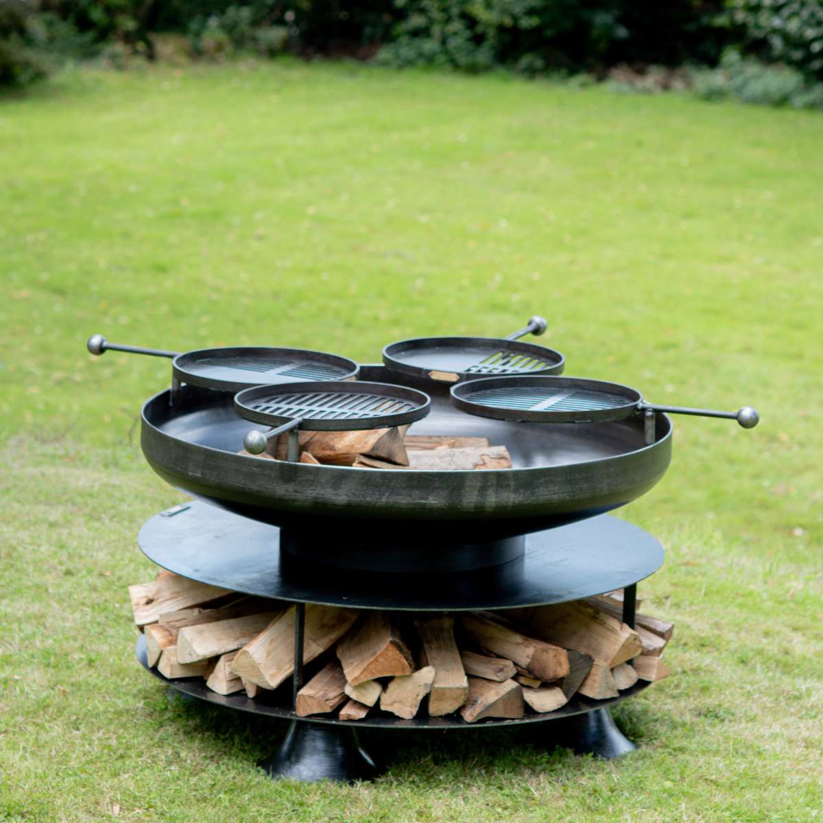 Firepits UK Ring of Logs with Four Swing Arm BBQ Racks 120cm ROL120SWA/4