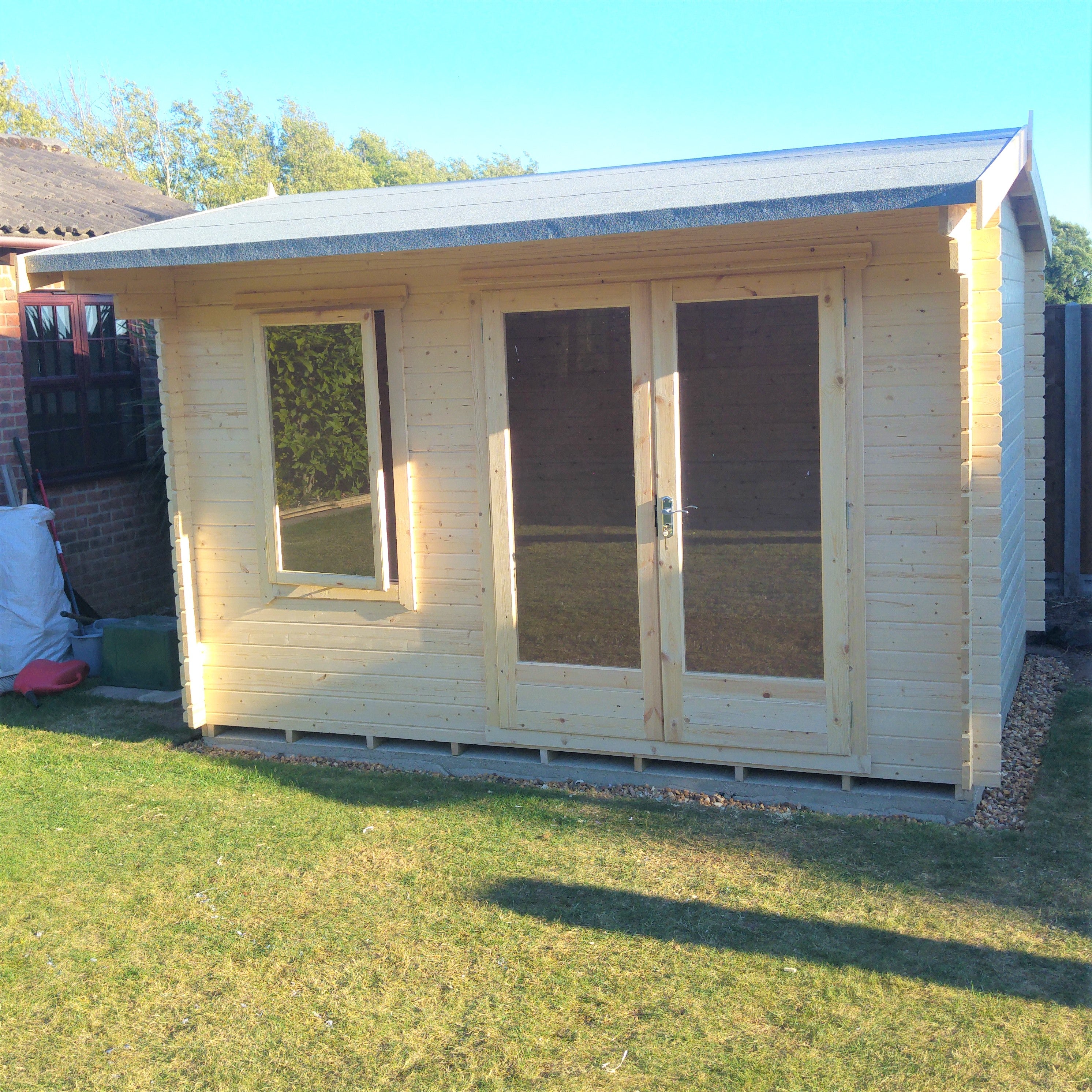 Shire Marlborough 28mm Log Cabin (12x12) MARL1212L28-1AA - Outside Store