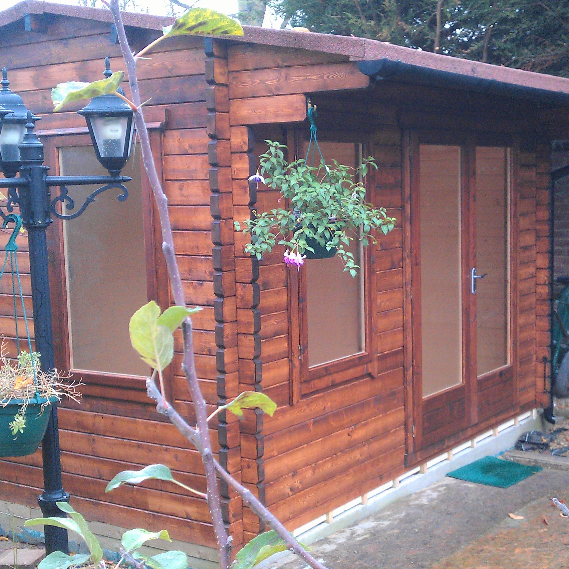 Shire Marlborough 28mm Log Cabin (12x12) MARL1212L28-1AA - Outside Store