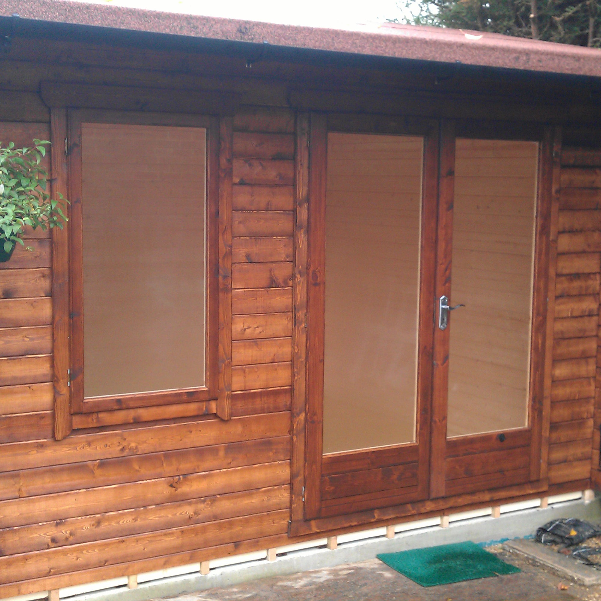 Shire Marlborough 28mm Log Cabin (12x12) MARL1212L28-1AA - Outside Store
